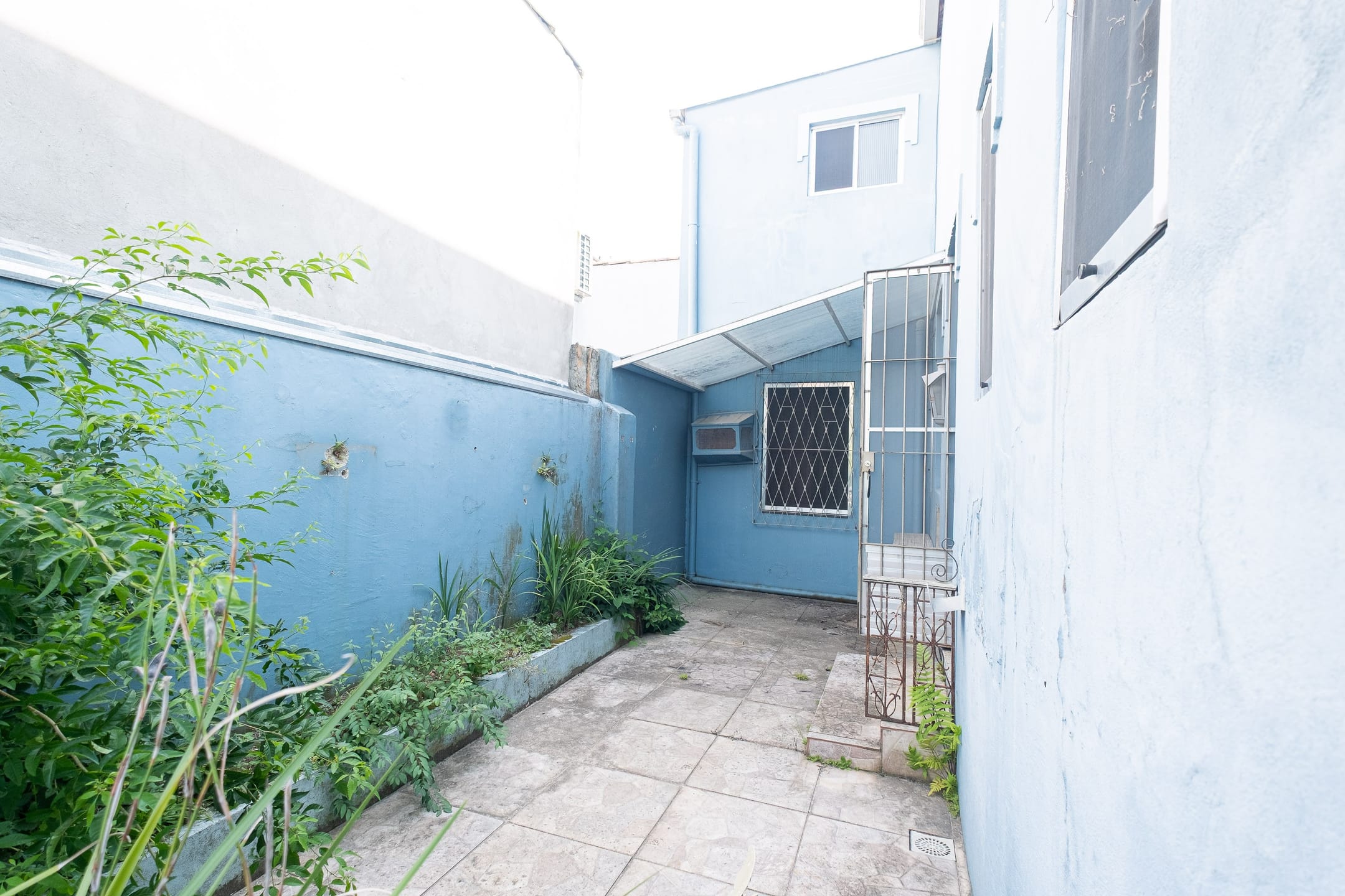 Casa à venda no centro de Pelotas - com 202 m², 3 quartos (sendo 1 suíte), peças amplas e ideal para uso residencial ou comercial. - 16