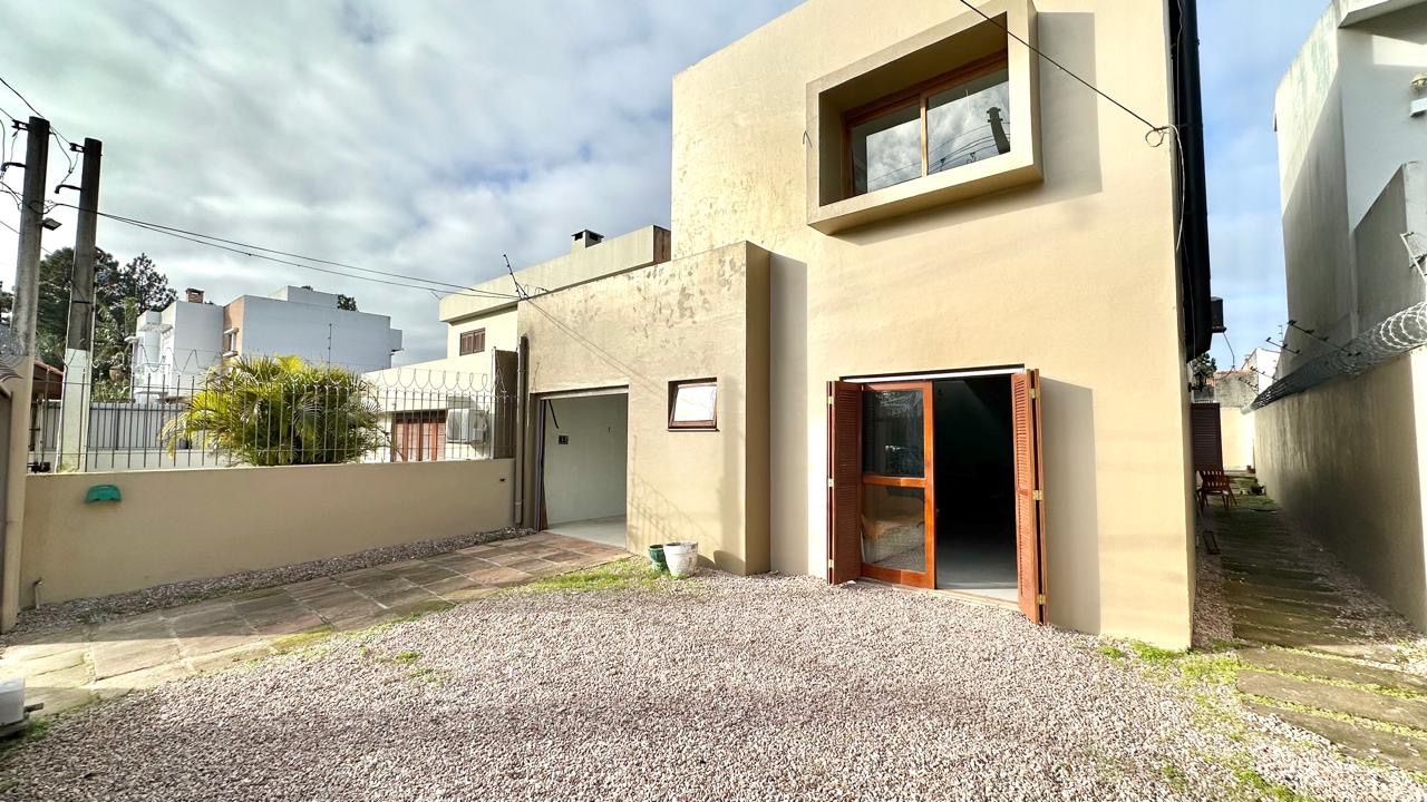 Casa à venda no Laranjal, Pelotas - com 160 m², 3 quartos, lareira e amplo pátio com churrasqueira. - 14
