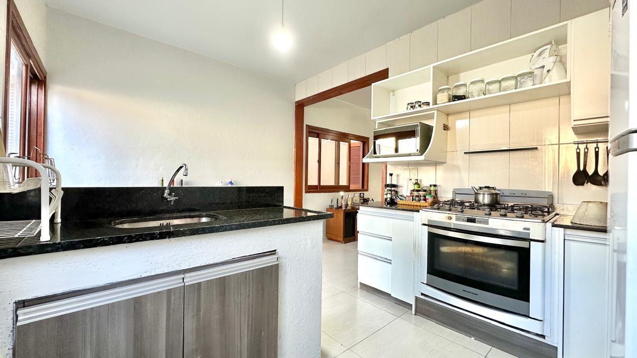 Casa à venda no Laranjal, Pelotas - com 160 m², 3 quartos, lareira e amplo pátio com churrasqueira. - 7
