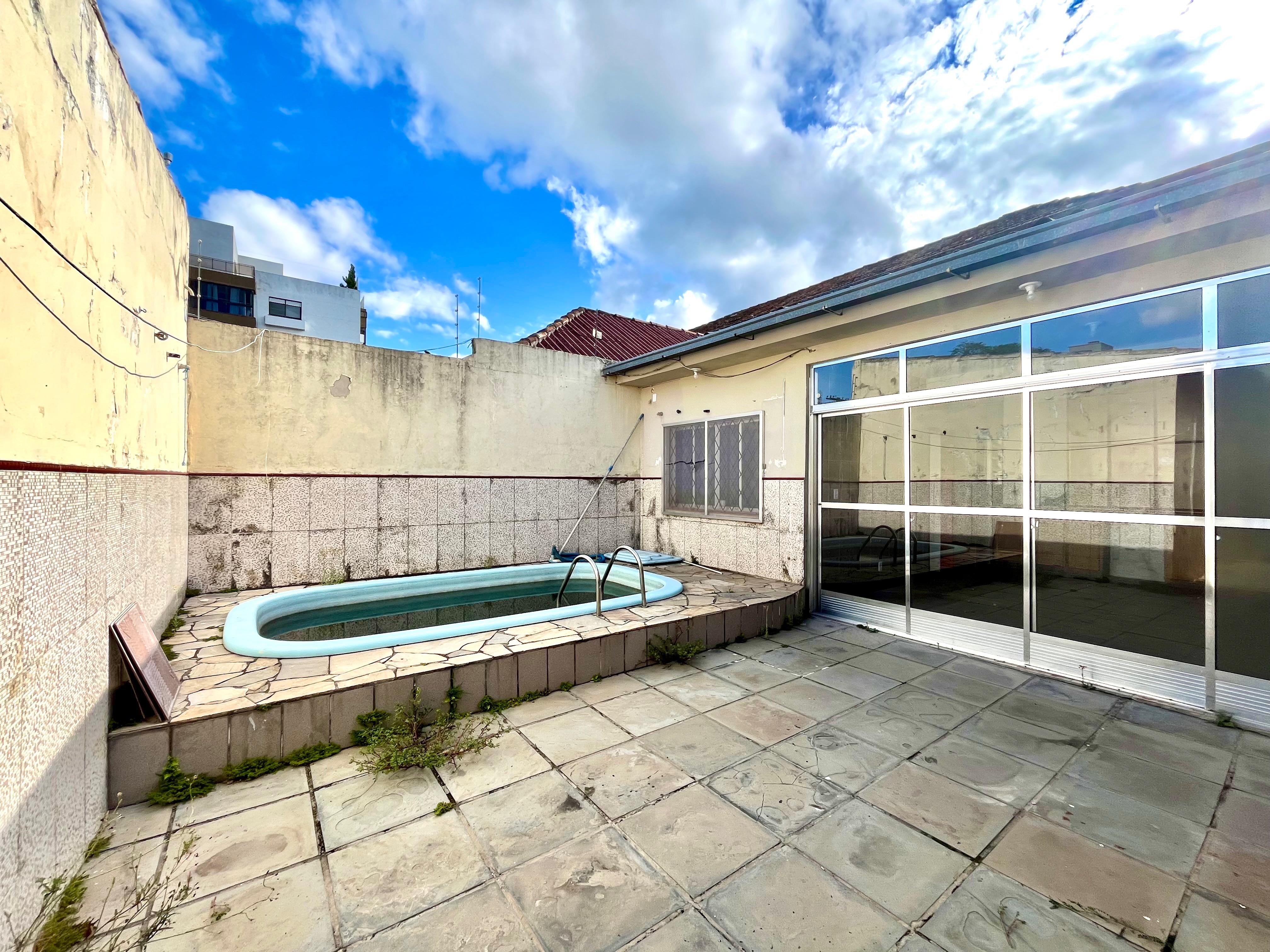 Casa à venda no centro de Pelotas - 132 m², 2 quartos, garagem e área de lazer com piscina e churrasqueira. - 13