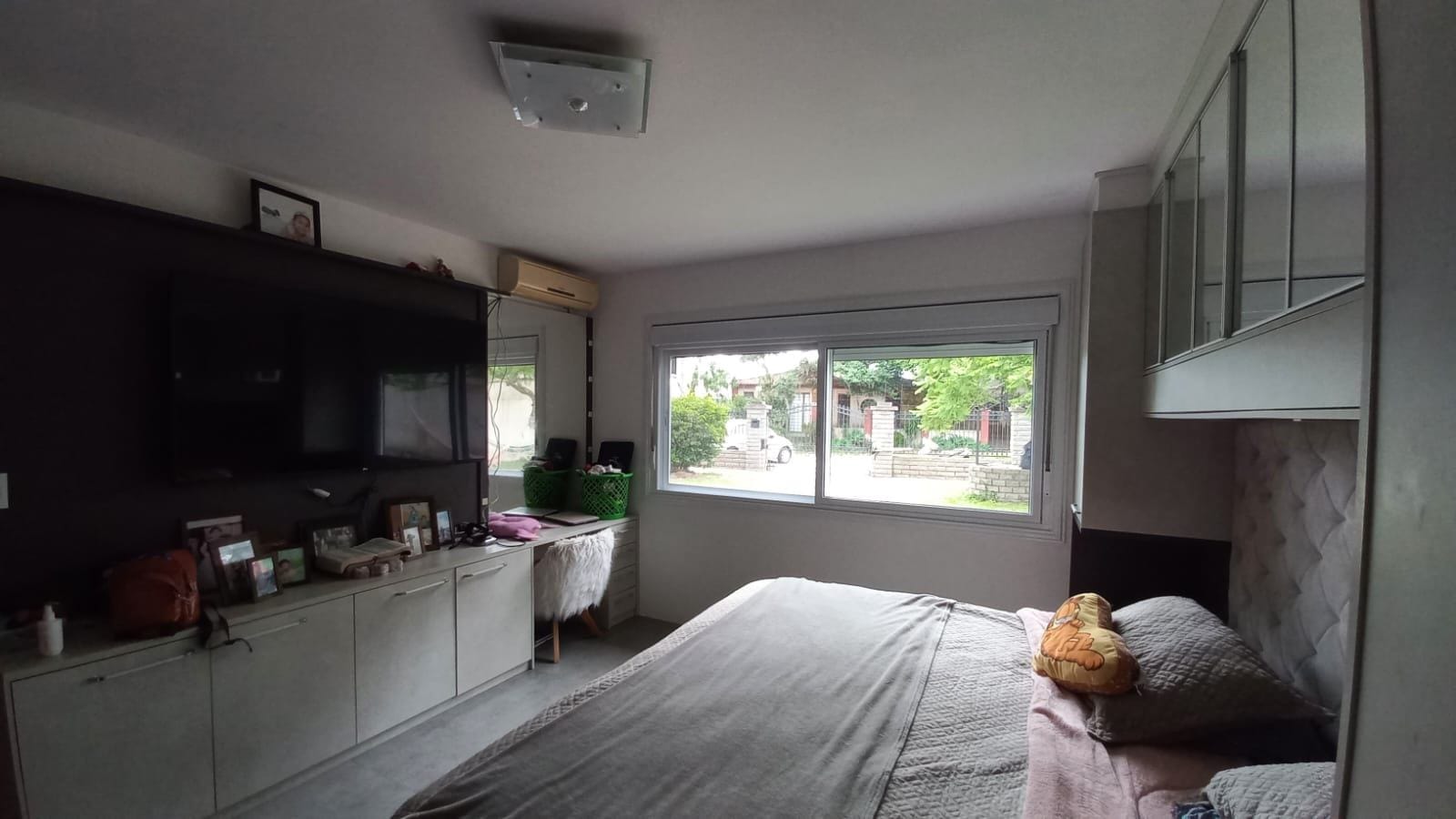 Casa à venda no Laranjal, Pelotas - 150 m² 3 quartos (sendo 1 suíte com closet), espaço gourmet com churrasqueira, piscina e amplo pátio. - 10