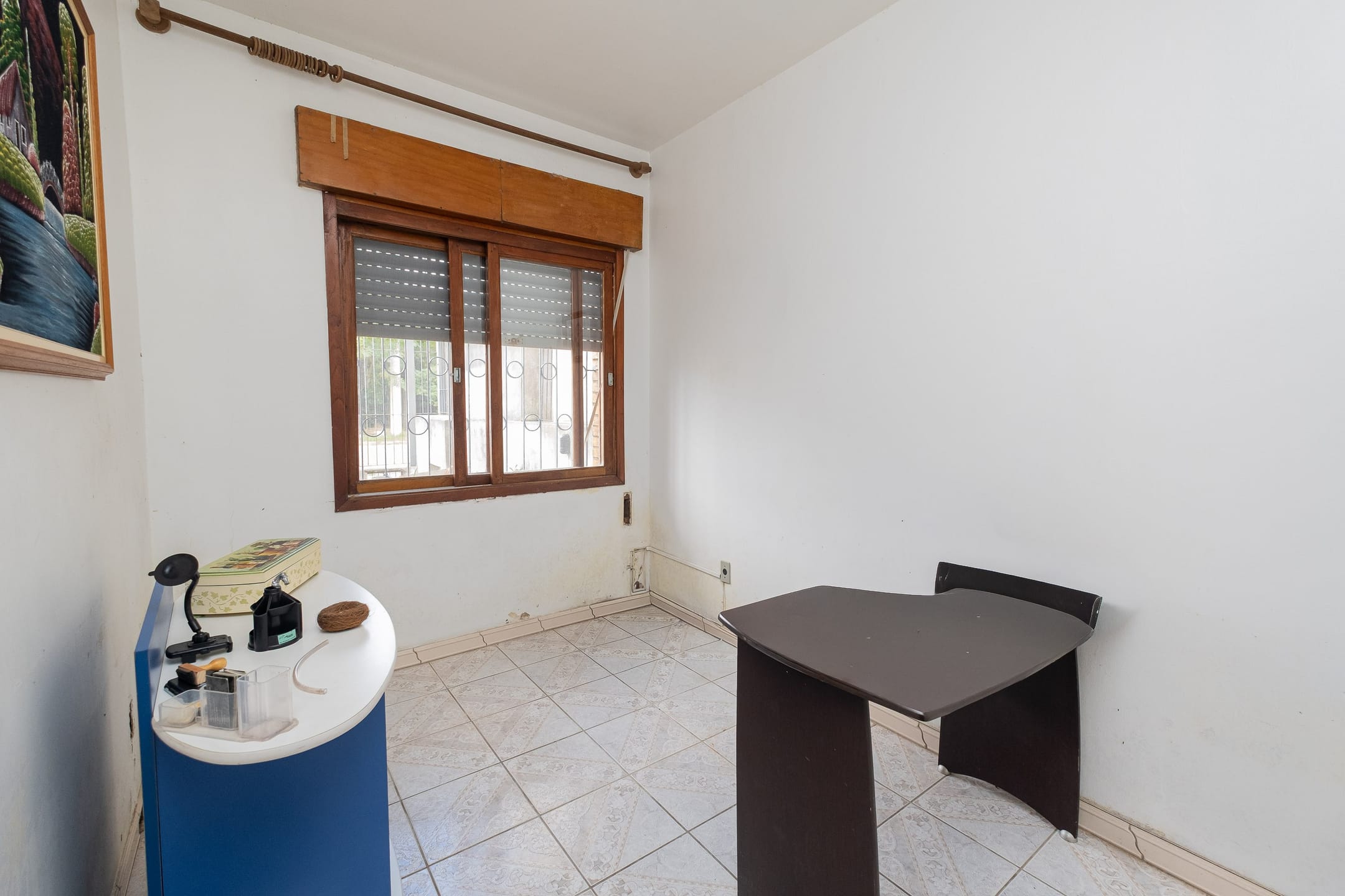 Casa à venda no Areal, Pelotas - 372 m², 4 quartos (sendo 2 suítes), churrasqueira, pátio aos fundos e portão eletrônico. - 8