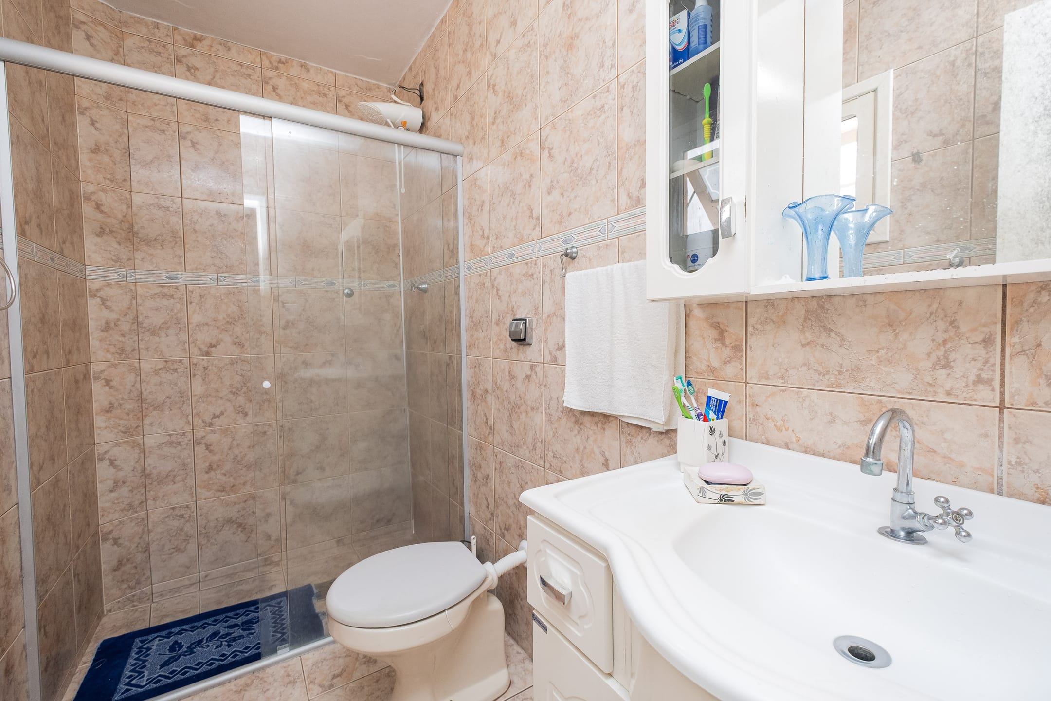 Casa à venda no Umuharama, São Gonçalo - 235m², 3 quartos, móveis planejados, espaço gourmet com churrasqueira e garagem coberta. - 10