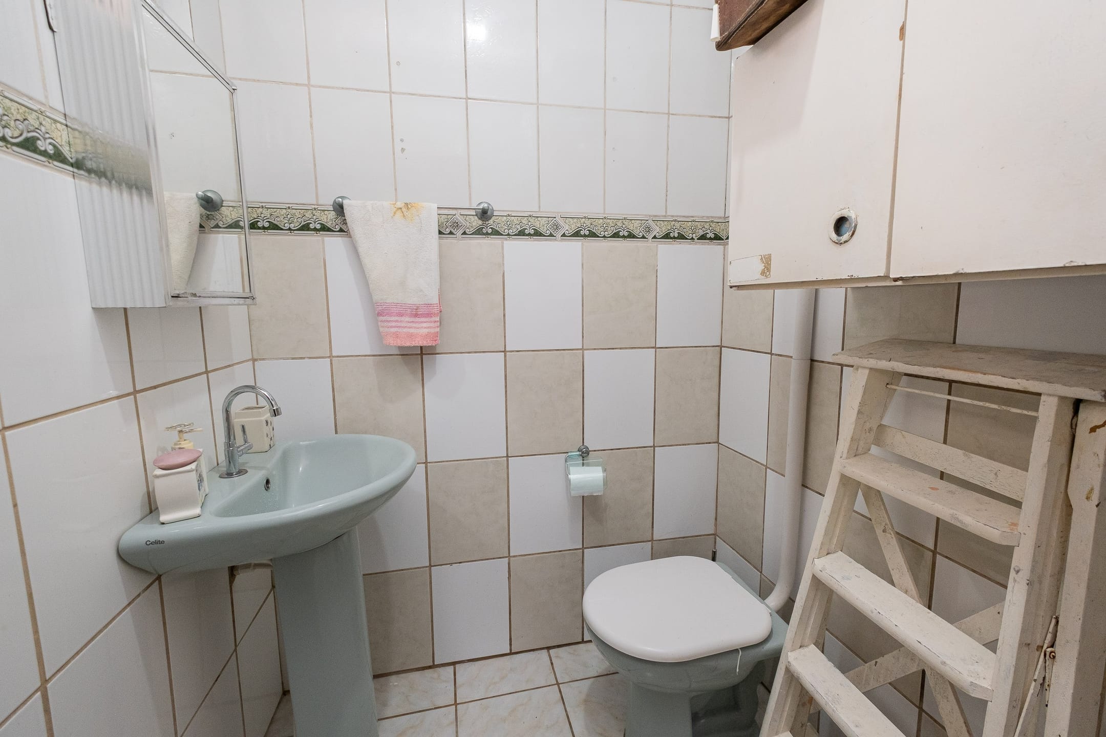 Casa à venda no Umuharama, São Gonçalo - 235m², 3 quartos, móveis planejados, espaço gourmet com churrasqueira e garagem coberta. - 18
