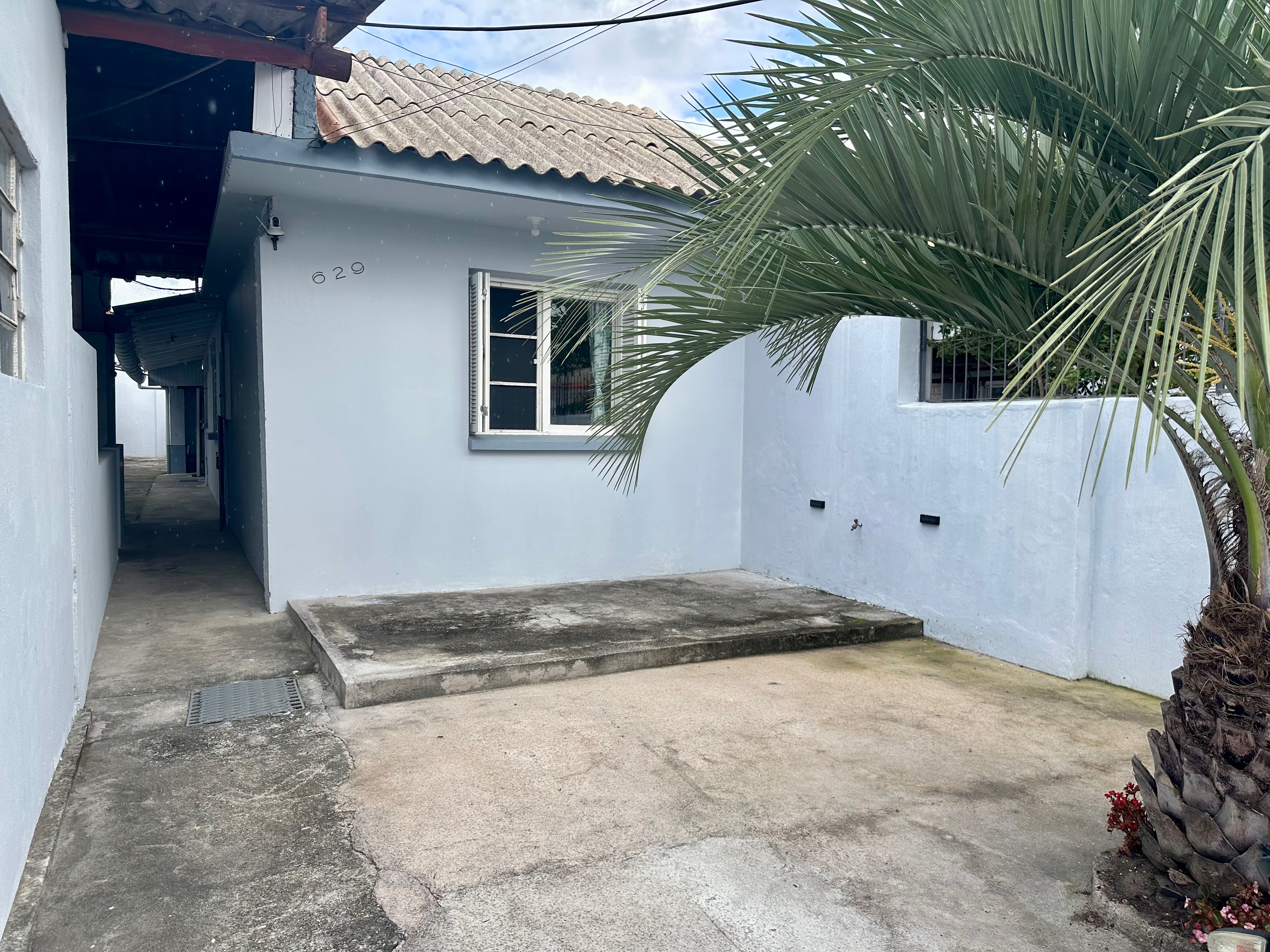 Casa à venda no centro de Pelotas - 221 m², 4 quartos, espaço gourmet com churrasqueira e pátio com garagem. - 12