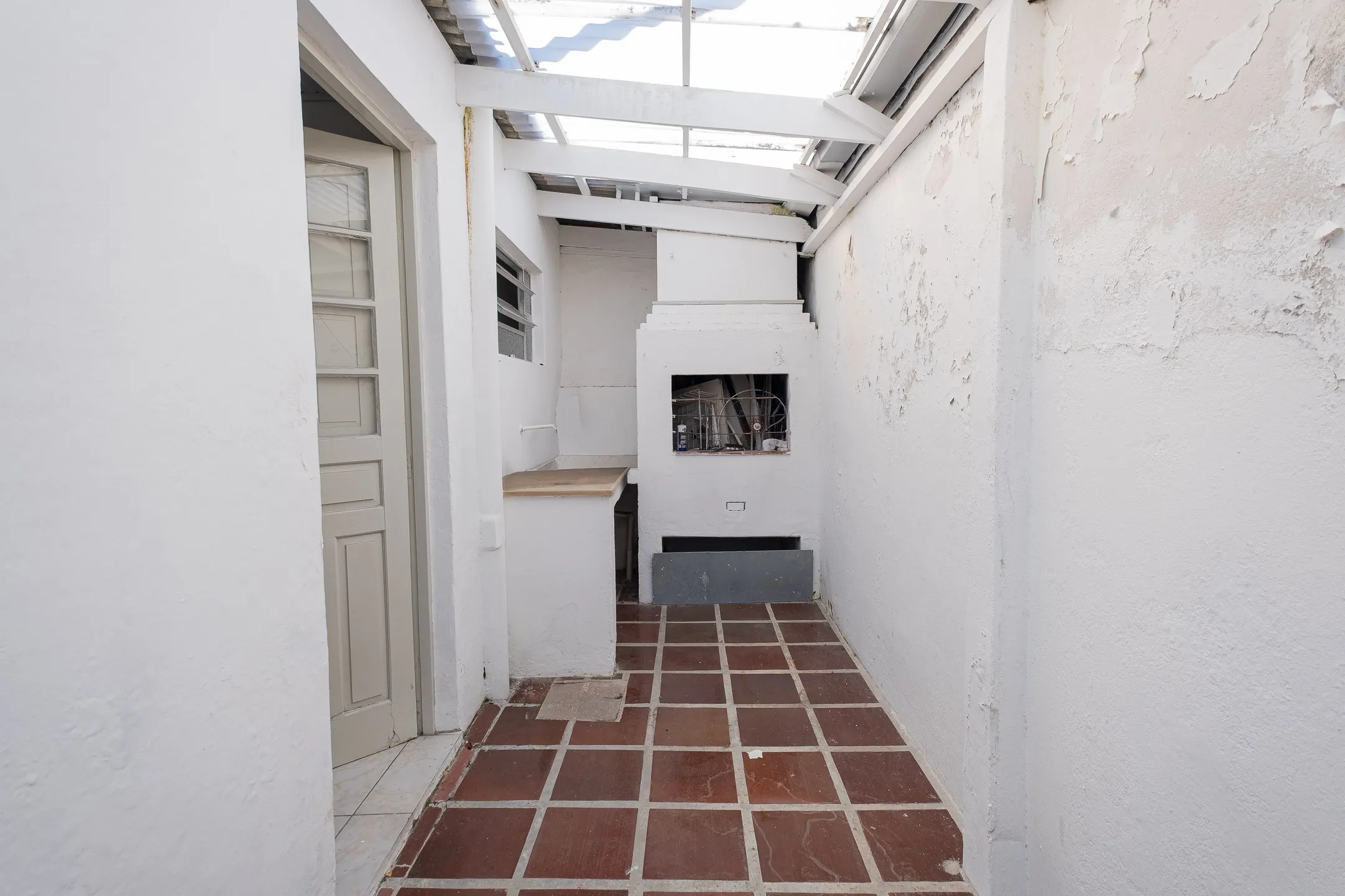 Casa à venda no centro de Pelotas - 86 m², 2 quartos, piso laminado, toda reformada e com churrasqueira. - 14