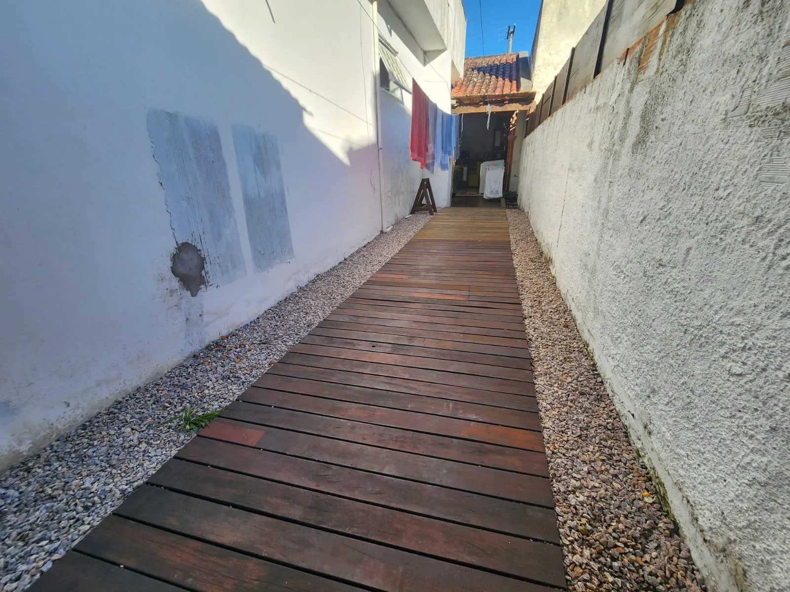 Casa à venda no Laranjal, Pelotas - 175 m², 2 quartos, lareira, amplo espaço gourmet com churrasqueira e pátio com piscina. - 18