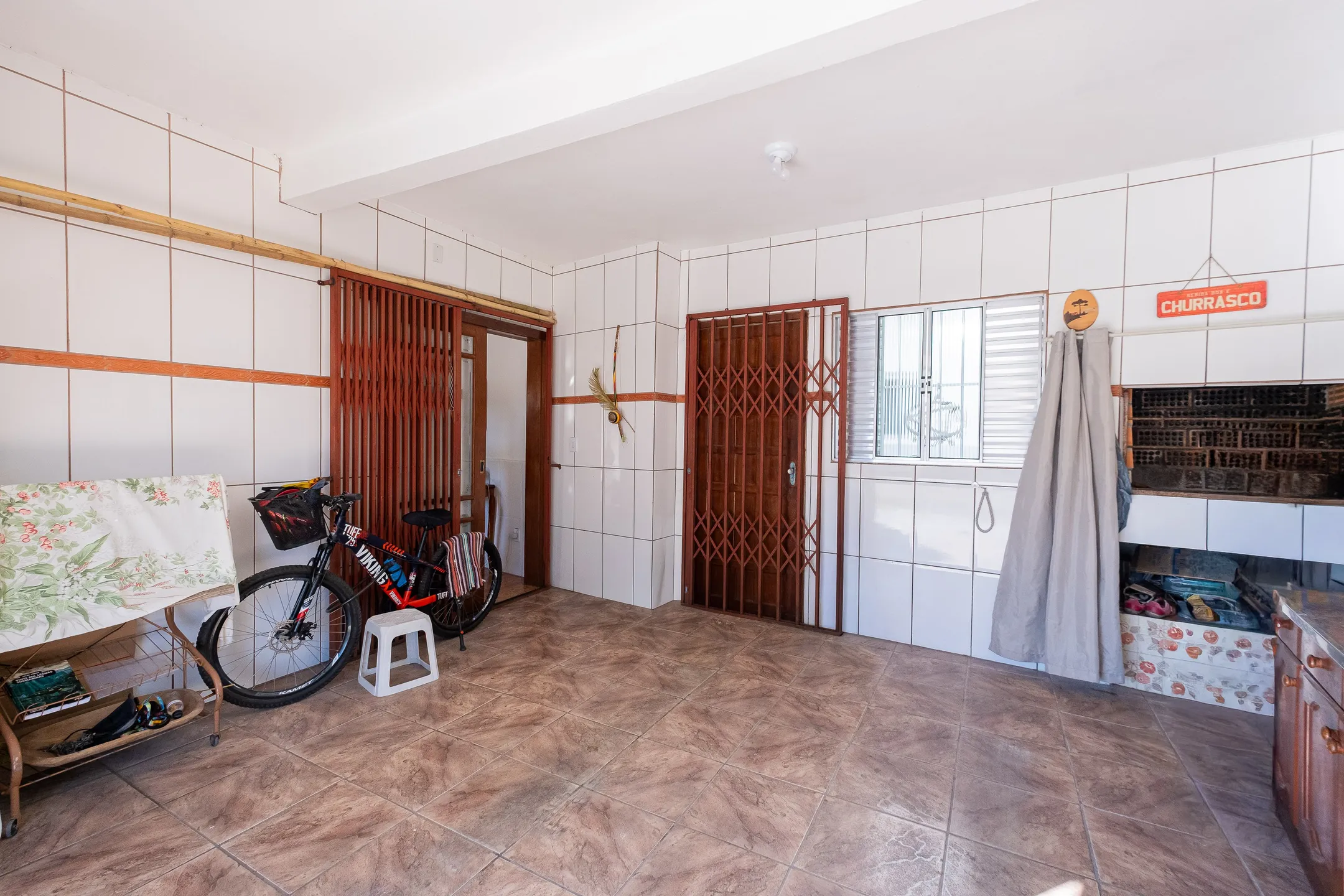 Casa à venda no São Gonçalo, Pelotas - 109 m², 2 quartos, pátio com piscina, garagem e apenas a uma quadra da Avenida JK. - 13