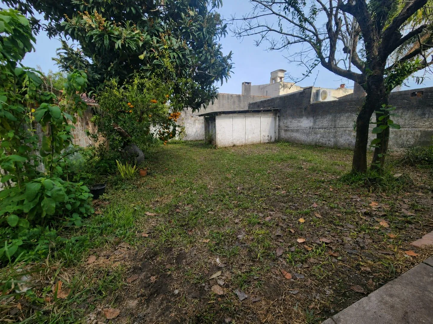 Casa à venda no centro de Pelotas - 114 m², 2 quartos, sala com lareira, ótima posição solar e amplo pátio aos fundos. - 10