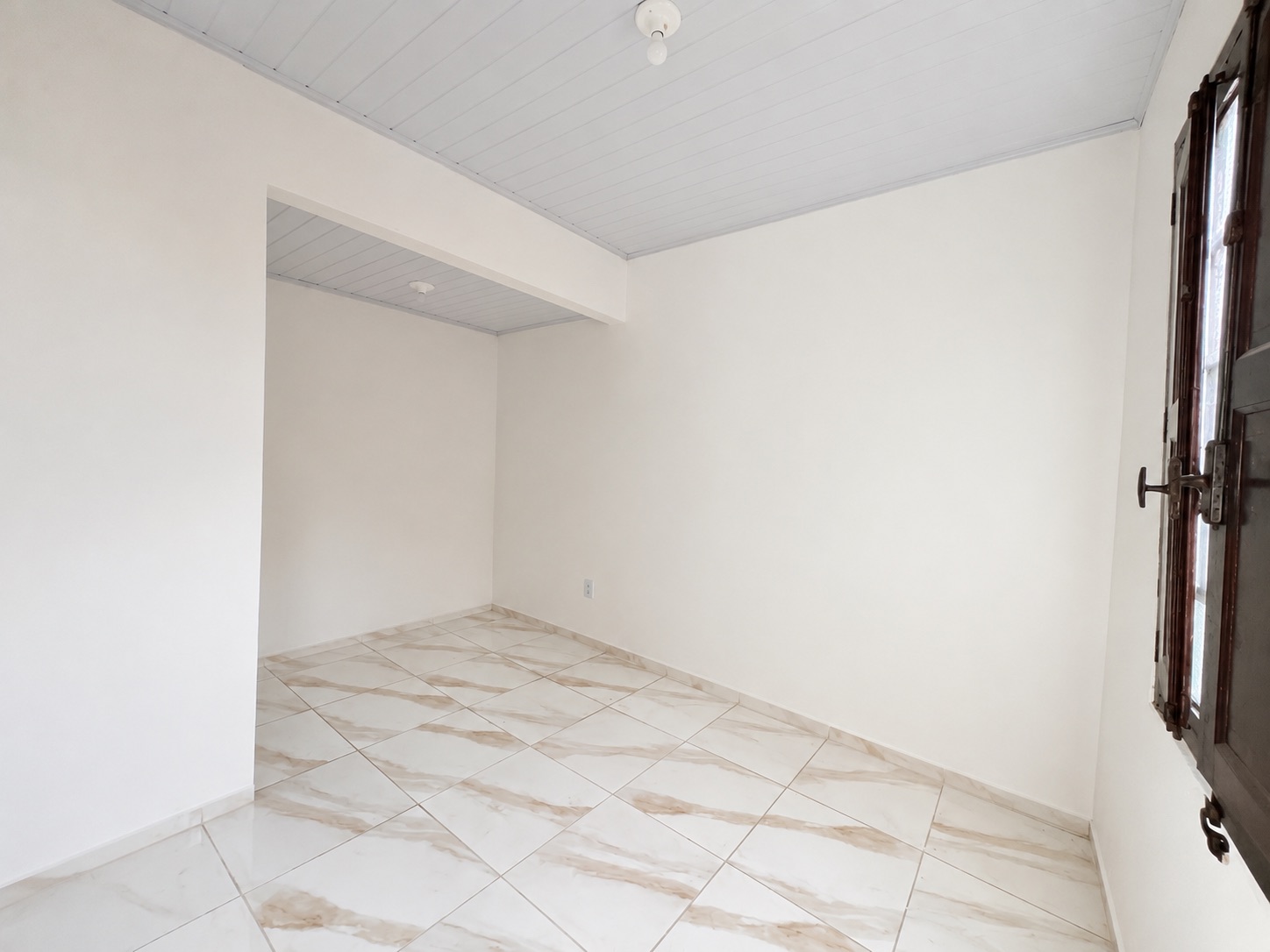 Casa residencial e comercial à venda no centro de Pelotas - 167 m², todo reformado com acabamentos modernos e ampla área nos fundos. - 7