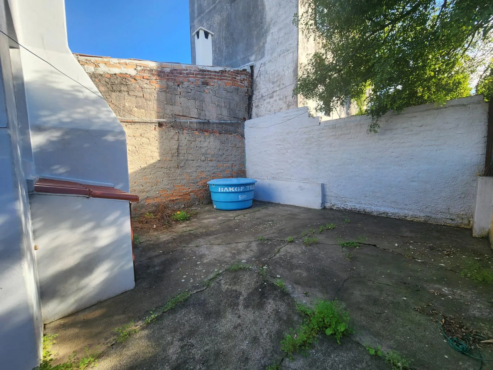 Casa à venda no Simões Lopes, Fragata - 135 m², 2 quartos, sala com lareira, churrasqueira, amplo pátio e garagem. - 17