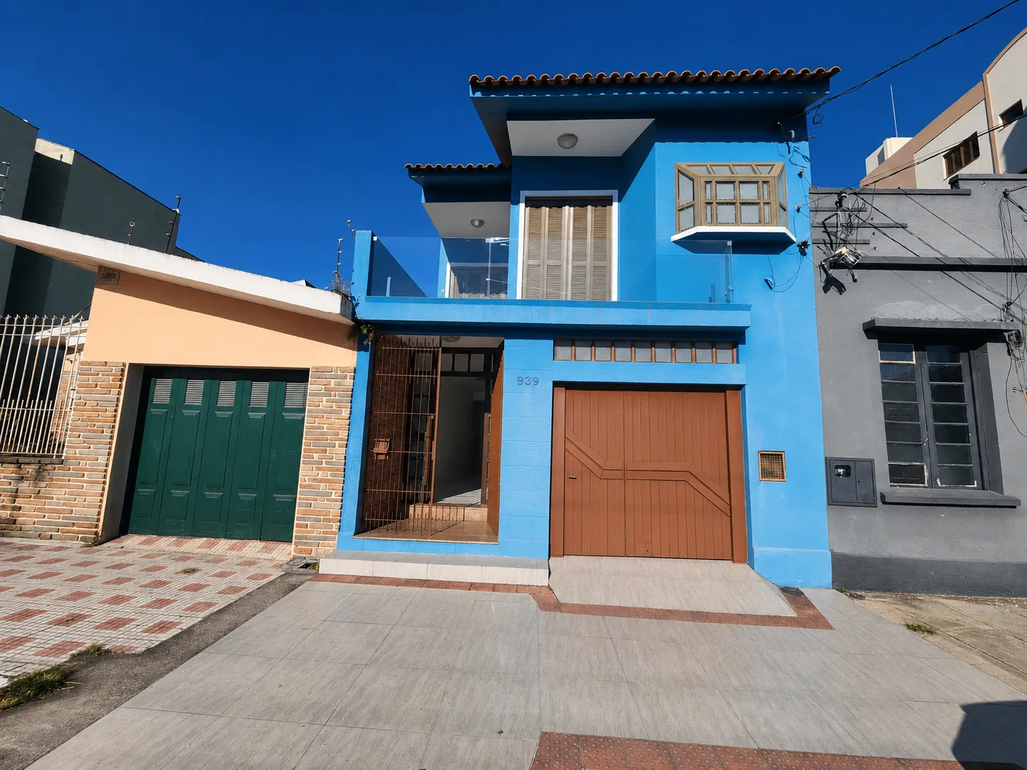 Casa à venda no centro de Pelotas - 282 m², 4 quartos (sendo 1 suíte com hidro), espaço gourmet com churrasqueira e garagem. - 26