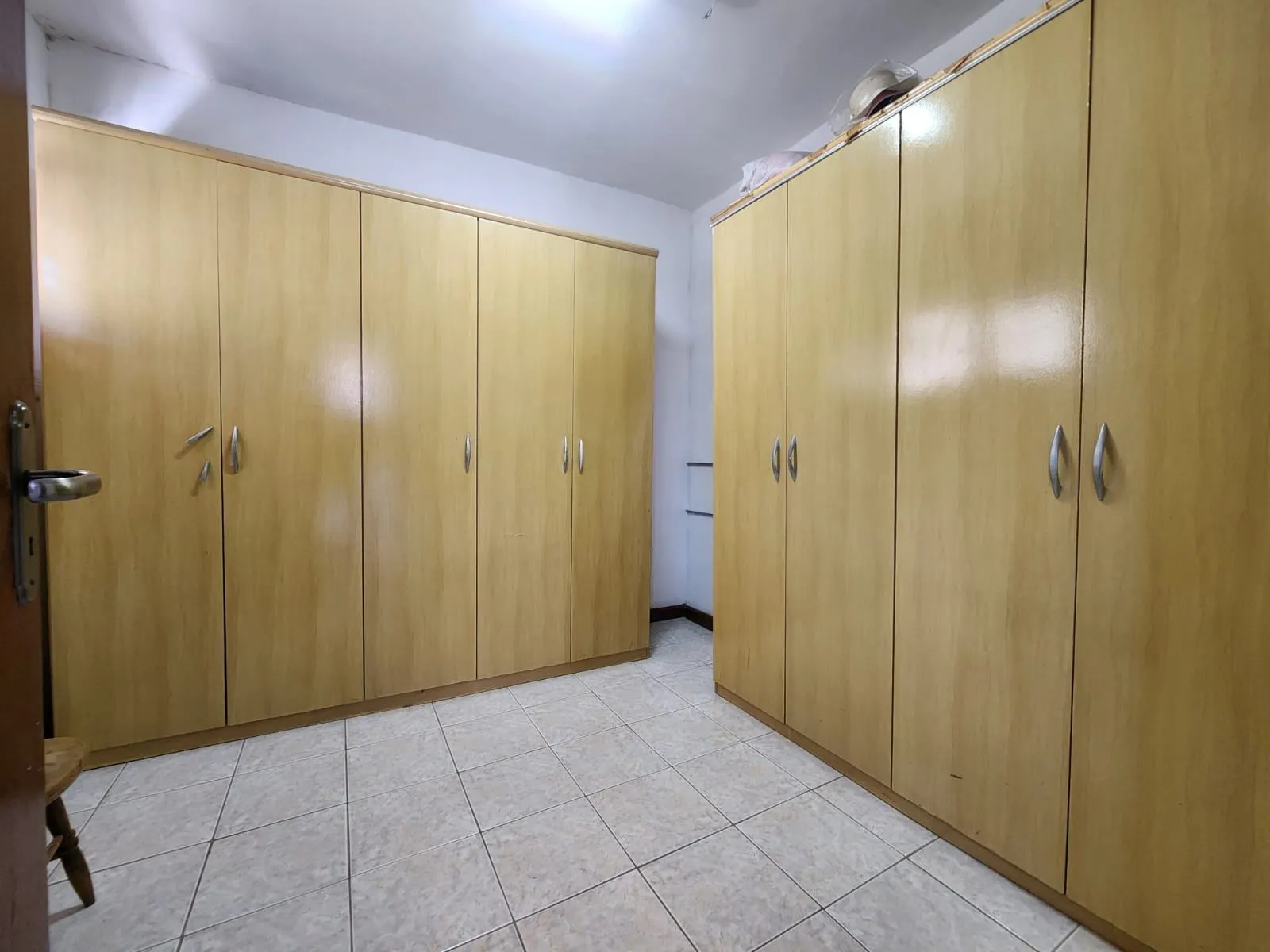 Casa à venda no centro de Pelotas - 282 m², 4 quartos (sendo 1 suíte com hidro), espaço gourmet com churrasqueira e garagem. - 21