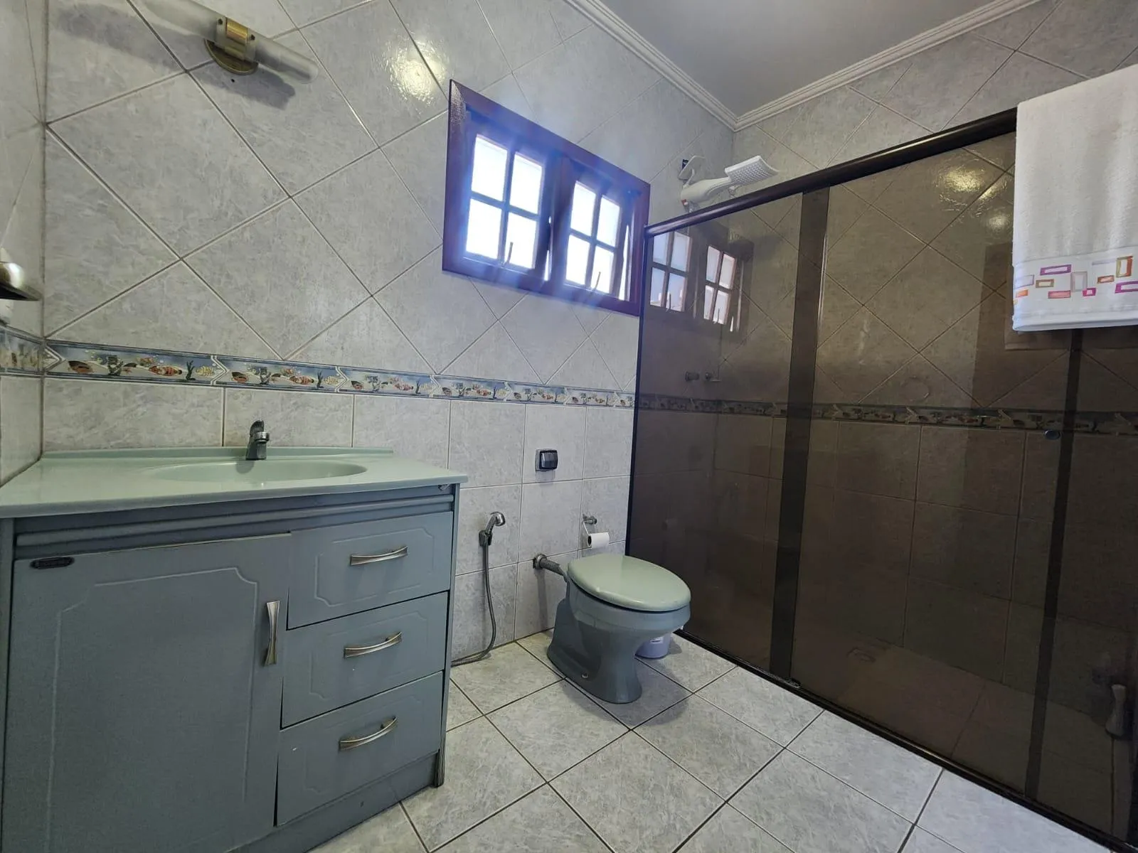 Casa à venda no centro de Pelotas - 282 m², 4 quartos (sendo 1 suíte com hidro), espaço gourmet com churrasqueira e garagem. - 16