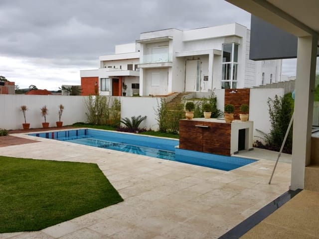 Casa com 716m² 4 quartos e 3 banheiros, à venda ou para alugar, no bairro Condomínio Reserva do Paratehy em São José dos Campos