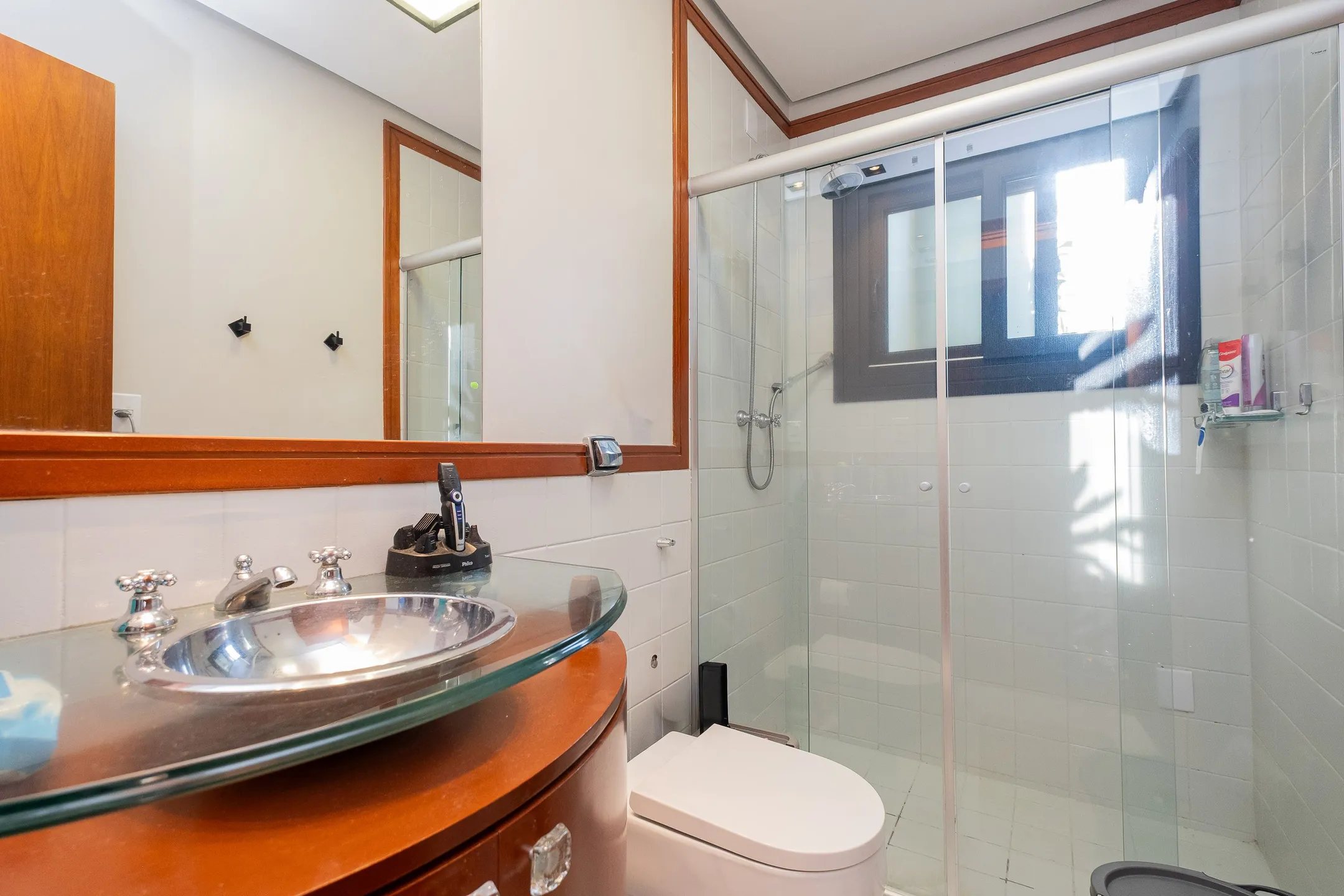 Casa de alto padrão à venda no centro de Pelotas - 314 m², 4 quartos (sendo 2 suítes), espaço gourmet com parrilla, piscina aquecida e localização nobre. - 12
