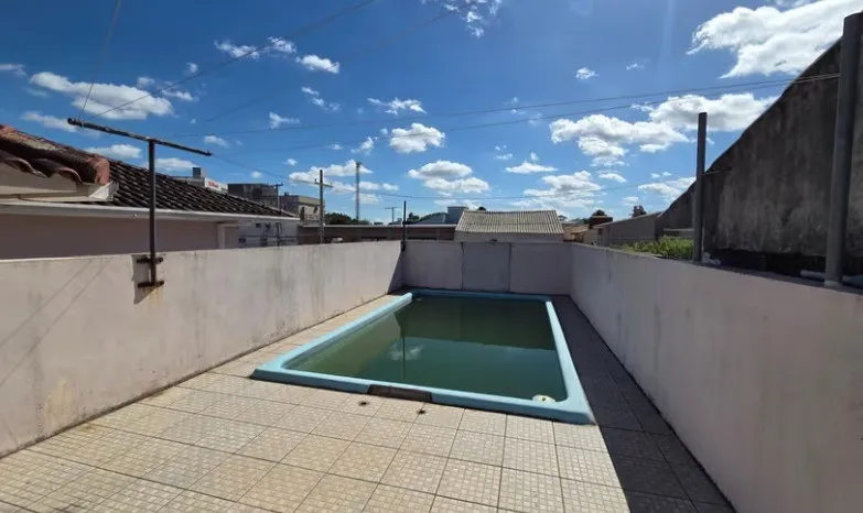 Casa à venda na Zona Norte de Pelotas - 185 m², 3 quartos (sendo 2 suítes), espaço gourmet com piscina e próximo a Dom Joaquim. - 20
