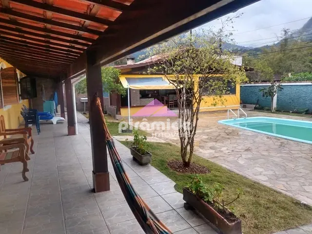 Casa com 1050m² 6 quartos e 6 banheiros, à venda, no bairro Massaguaçu em Caraguatatuba
