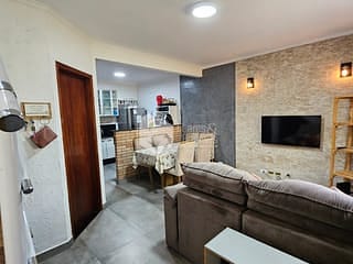 Foto do Casa-Casa em condomínio para venda em Chácara Seis de Outubro com 2 quartos, 60m²