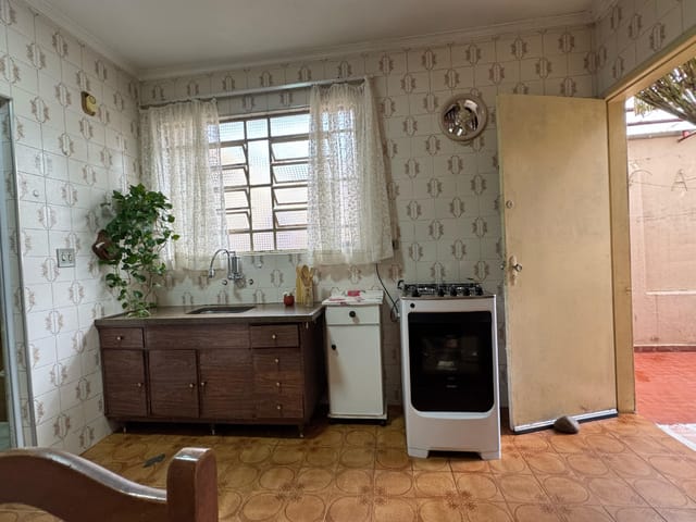 Foto do Casa - Casa tipo para venda em Vila Mangalot com 2 quartos, 92m² | Lares e Andares Imóveis