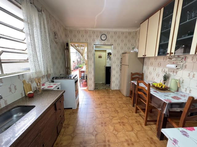 Foto do Casa - Casa tipo para venda em Vila Mangalot com 2 quartos, 92m² | Lares e Andares Imóveis