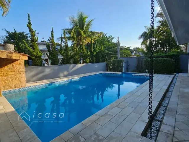 Casa com 498m² 4 quartos e 5 banheiros, à venda ou para alugar, no bairro Riviera de São Lourenço em Bertioga