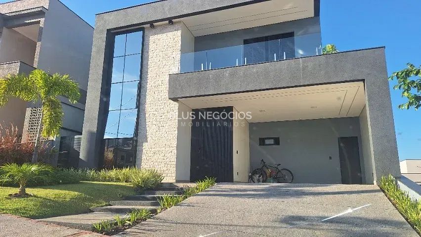 Casa à venda com 3 quartos, 303m² - Foto 1