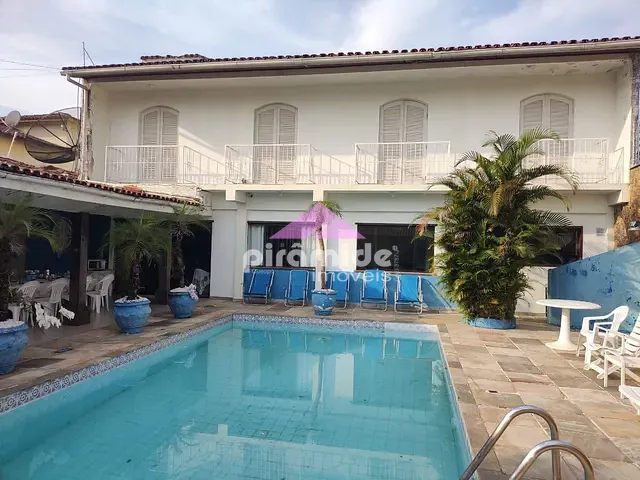 Casa com 630m² 5 quartos e 7 banheiros, à venda, no bairro Indaiá em Caraguatatuba