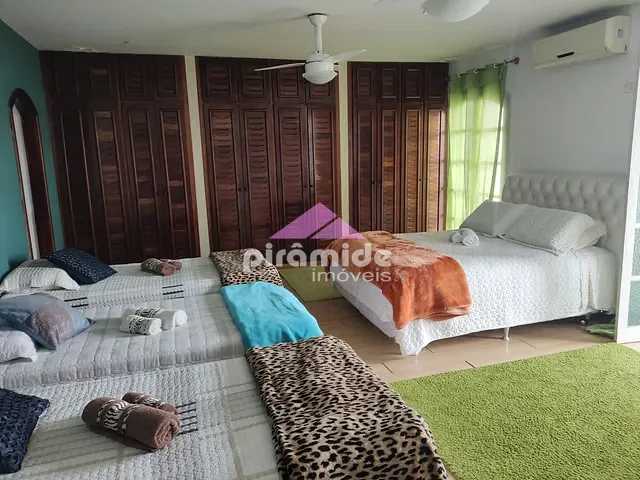 Casa com 630m² 5 quartos e 7 banheiros, à venda, no bairro Indaiá em Caraguatatuba
