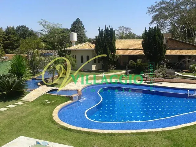 Chácara com 3800m² 3 quartos e 5 banheiros, à venda, no bairro Condomínio Monte Carlo em Guapiaçu