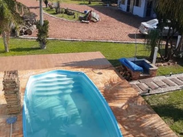 Foto do Chácara - Chácara à venda em Arapongas, 2.501m²: casa com 2 quartos (1 suíte), salão com churrasqueira, piscina, área gourmet, barracão e casa alugada. Ótima localização | Londrina Cred Imóveis