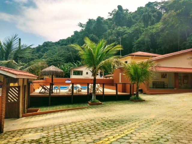 Foto do Kitnet - Pousada com 8 chalés à venda, 550 m² por R$ 1.950.000 - Massaguaçu - Caraguatatuba/SP | RUSSI IMÓVEIS
