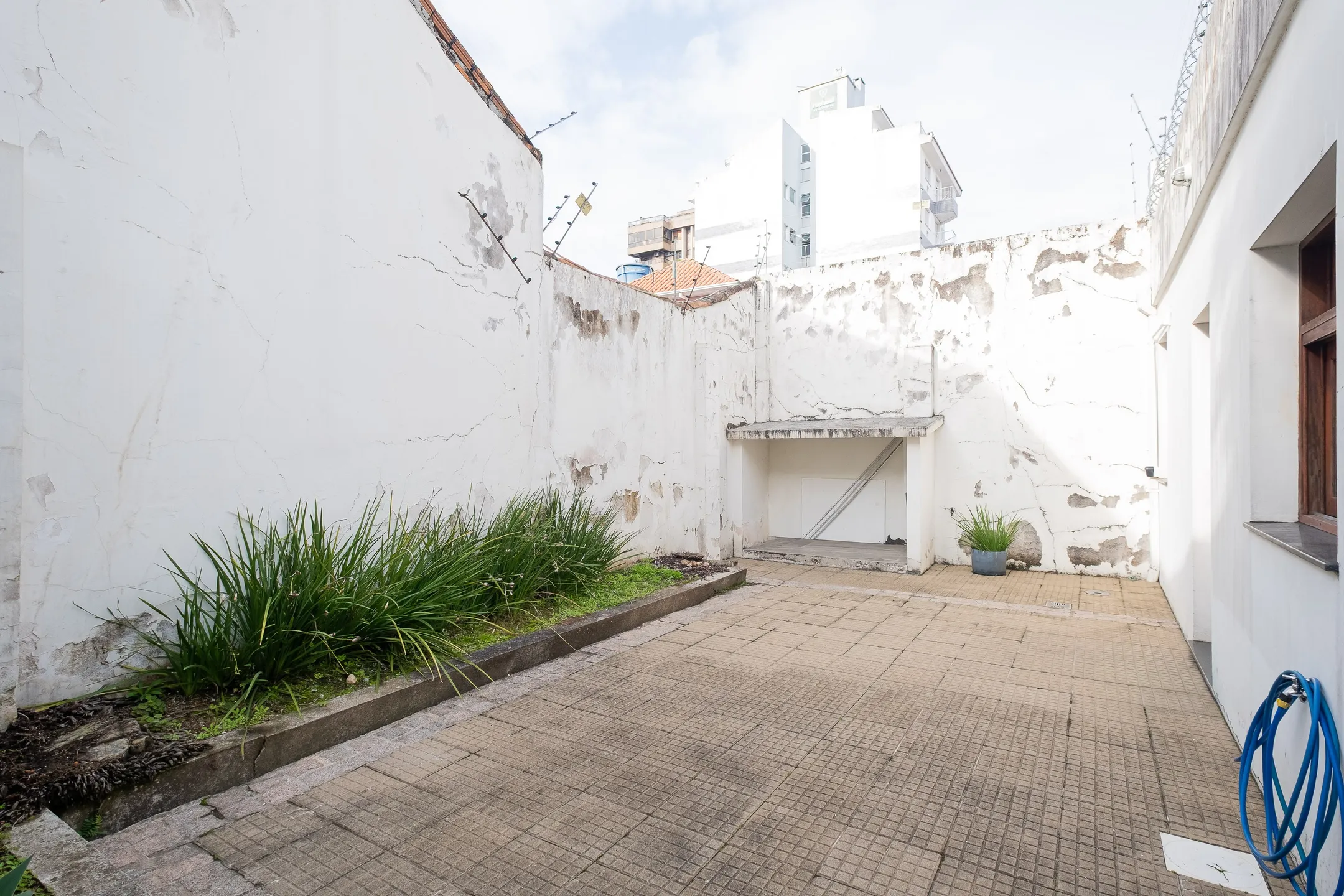 Prédio comercial à venda em Pelotas, próximo à Av. Bento Gonçalves - com 146m², recepção, 5 salas e excelente potencial para empresas e clínicas. - 18