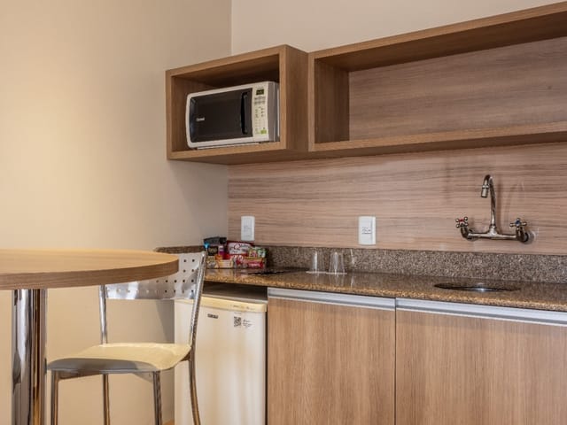 Foto do Salão - Flat para venda em Praia de Belas com 1 quarto, 38m² | Lares e Andares Imóveis