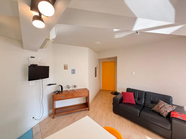 Foto do Salão - Flat para venda em Vila Nova Conceição com 1 quarto, sendo 1 suíte, 50m² | Lares e Andares Imóveis