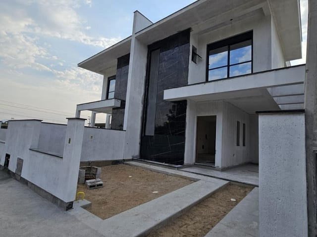 Foto do Sobrado - Sobrado com 3 dormitórios à venda, 100 m² por R$ 850.000,00 - Pinheira - Palhoça/SC | Madri Imóveis