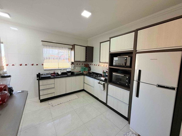 Foto do Sobrado - Sobrado com 2 apartamentos à Venda com 2 Sala comercial + casa com piscina, Centro, Balneário Barra do Sul, SC | North Center