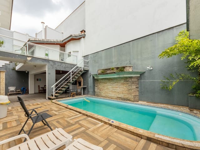 Foto do Sobrado - Sobrado para venda em Jardim São Caetano com 4 quartos, sendo 4 suítes, 393m² | Correteria Imóveis