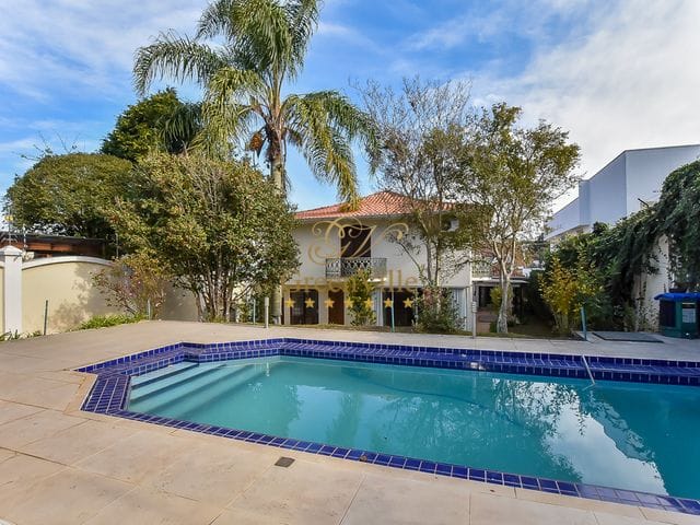 Foto do Sobrado - Casa Alto Padrão, 4 suítes, 6 vagas de garagens, piscina aquecida, Jd. Schaffer, 478m² averbados, R$ 1.750.000,00 Bosque do Alemão, Curitiba, PR | Imobiliária GreenVille