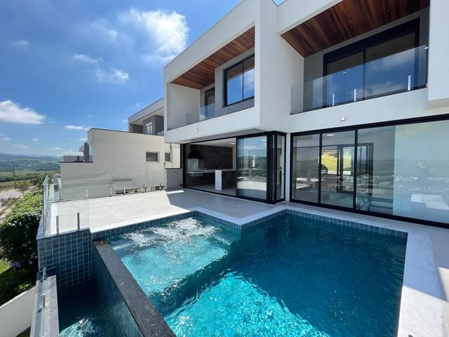 Foto do Sobrado - Sobrado com 4 dormitórios, 470 m² - venda por R$ 6.000.000,00 ou aluguel por R$ 25.930,00/mês - Condomínio Residencial Alphaville II - São José dos Campos/SP | RUSSI IMÓVEIS