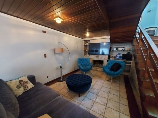 Foto do Casa - Casa à venda Colina do Sol, centro de Pelotas: 301 m², 4 quartos (sendo 1 suíte com closet), lareira e ampla área gourmet com piscina e churrasqueira. | UP Imóveis