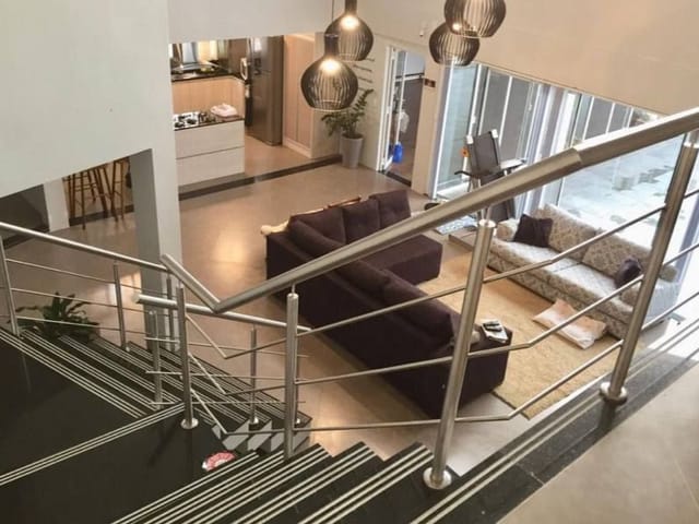 Foto do Casa - Sobrado Alto Padrão c/ Piscina, 2 Suítes c/ Closet, Lareira & Energia Solar – 382 m² | 2 Vagas | Recanto de Portugal, Pelotas/RS | UP Imóveis