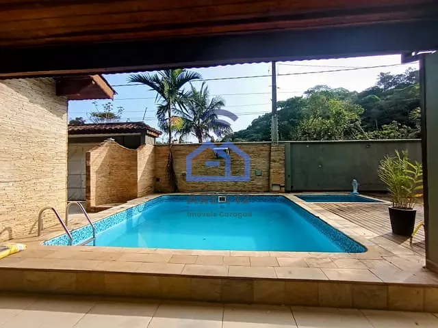 Casa com 900m² 4 quartos e 4 banheiros, à venda, no bairro Capricónio III em Caraguatatuba