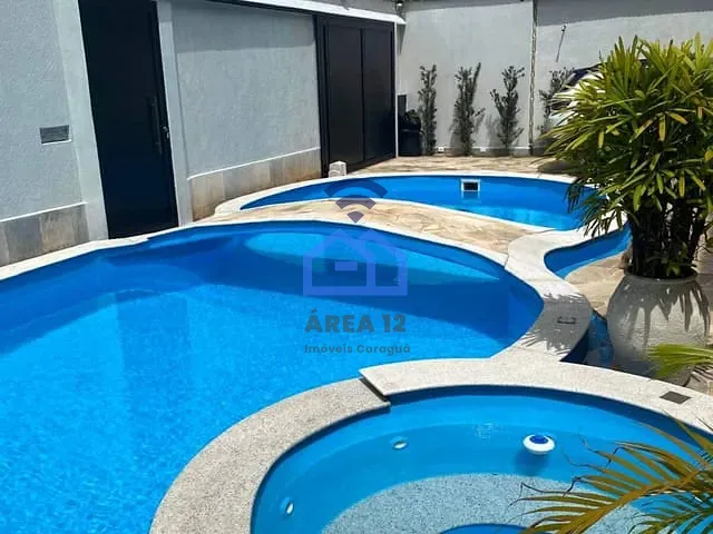 Sobrado com 512m² 7 quartos e 9 banheiros, à venda, no bairro Indaiá em Caraguatatuba