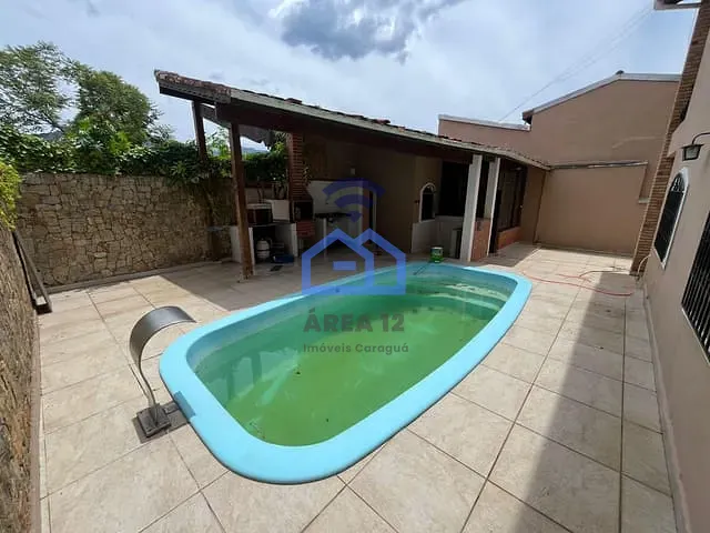 Sobrado com 337m² 4 quartos e 2 banheiros, à venda, no bairro Indaiá em Caraguatatuba