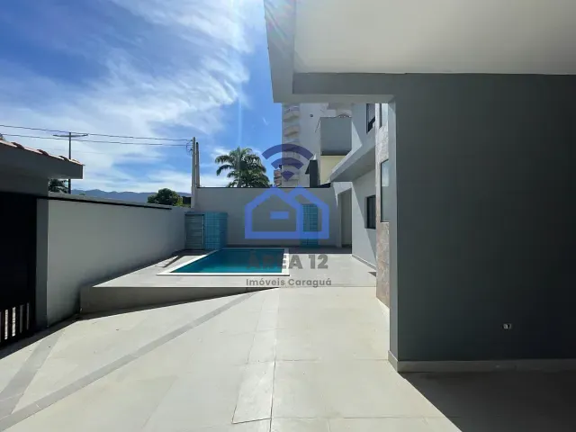 Sobrado com 304m² 4 quartos e 4 banheiros, à venda, no bairro Indaiá em Caraguatatuba
