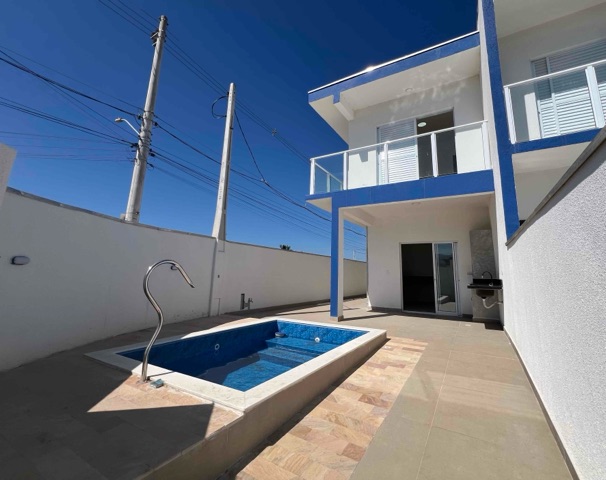 Foto do Sobrado - Sobrado à Venda, 3 dormitórios, 1 suíte, 2 vagas, 120m², Golfinhos, Caraguatatuba, SP | Necta Serviços Imobiliários Ltda