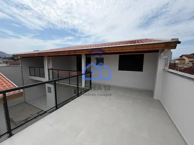 Sobrado 3 quartos e 4 banheiros, à venda, no bairro Indáia em Caraguatatuba