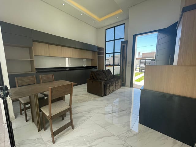 Foto do Casa - Casa mobiliada à venda no Cassino, Rio Grande: 80 m², 2 quartos (sendo 1 suíte), lareira, espaço gourmet com piscina e churrasqueira. | UP Imóveis