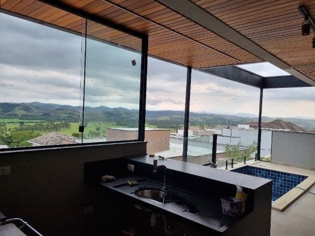 Foto do Sobrado - Sobrado com 4 dormitórios à venda, 405 m² por R$ 2.890.000,00 - Condomínio Residencial Jaguary - São José dos Campos/SP | RUSSI IMÓVEIS